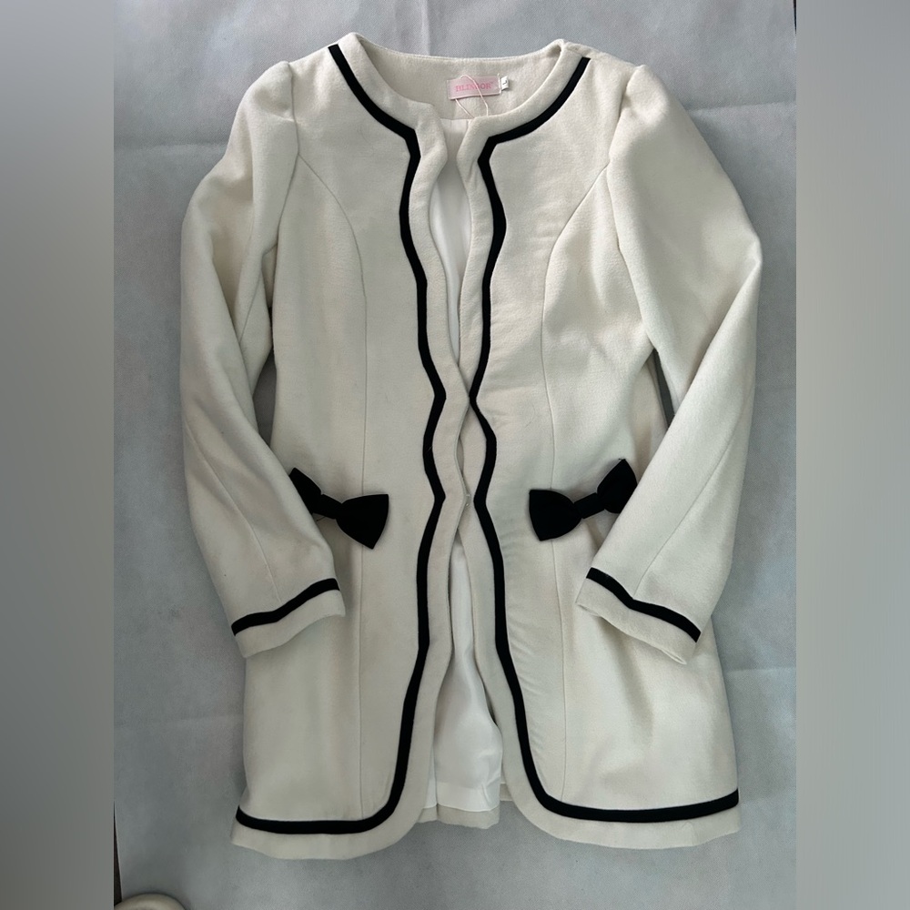 Black and white dress coat fully lined with two snap front closures